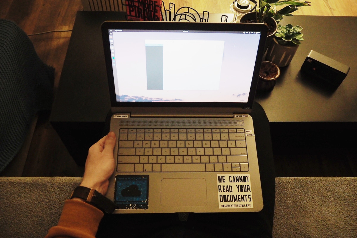 Photo of me holding my laptop